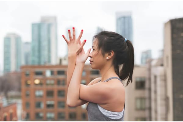 A woman doing Yoga at Twenty Fair Apartments, New Haven, CT